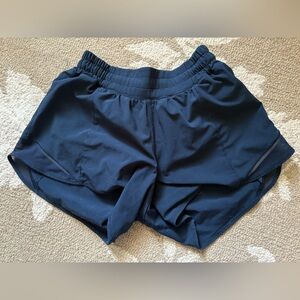 Lululemon Navy Hotty Hot 4” inseam shorts